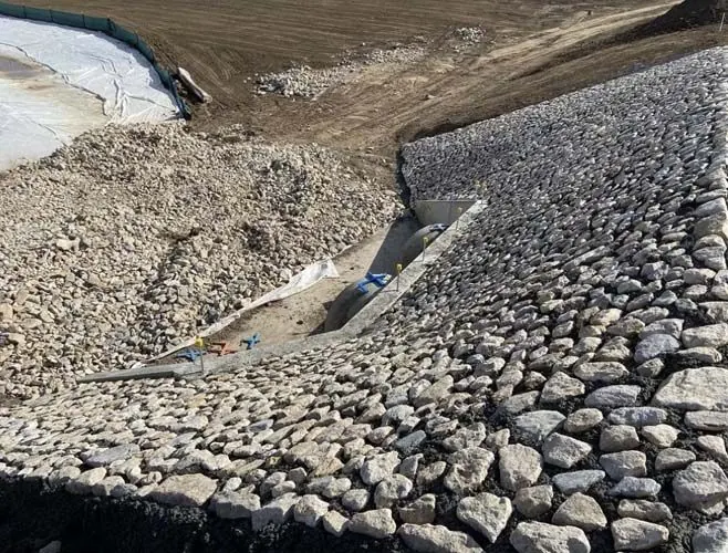 Hand-placed rock pitching by All Stone & Pave
