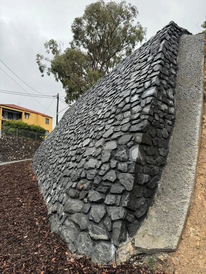 Hand-placed rock pitching by All Stone & Pave